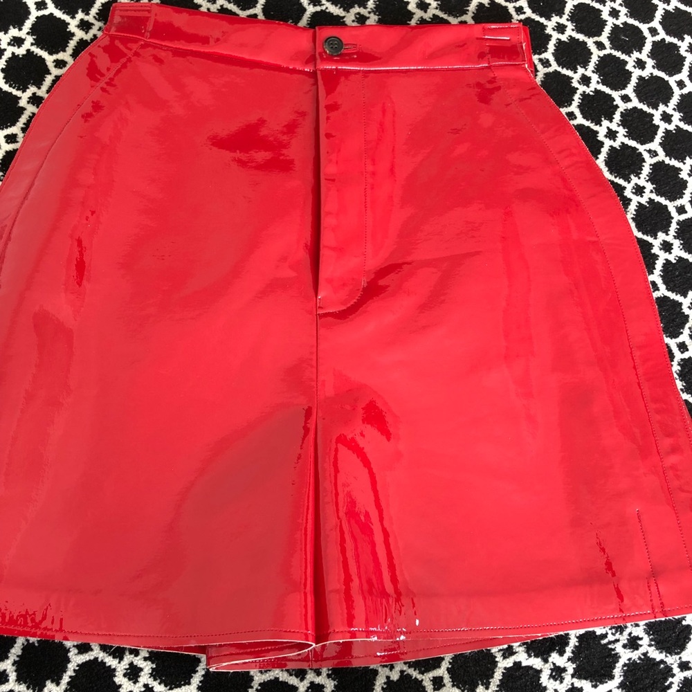Red junya wantanabe patent leather shorts